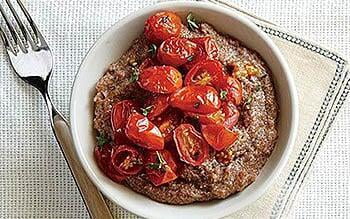 Creamy gorgonzola teff with herb-roasted tomatoes