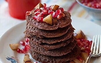 Teff pancakes with pomegranates and pears